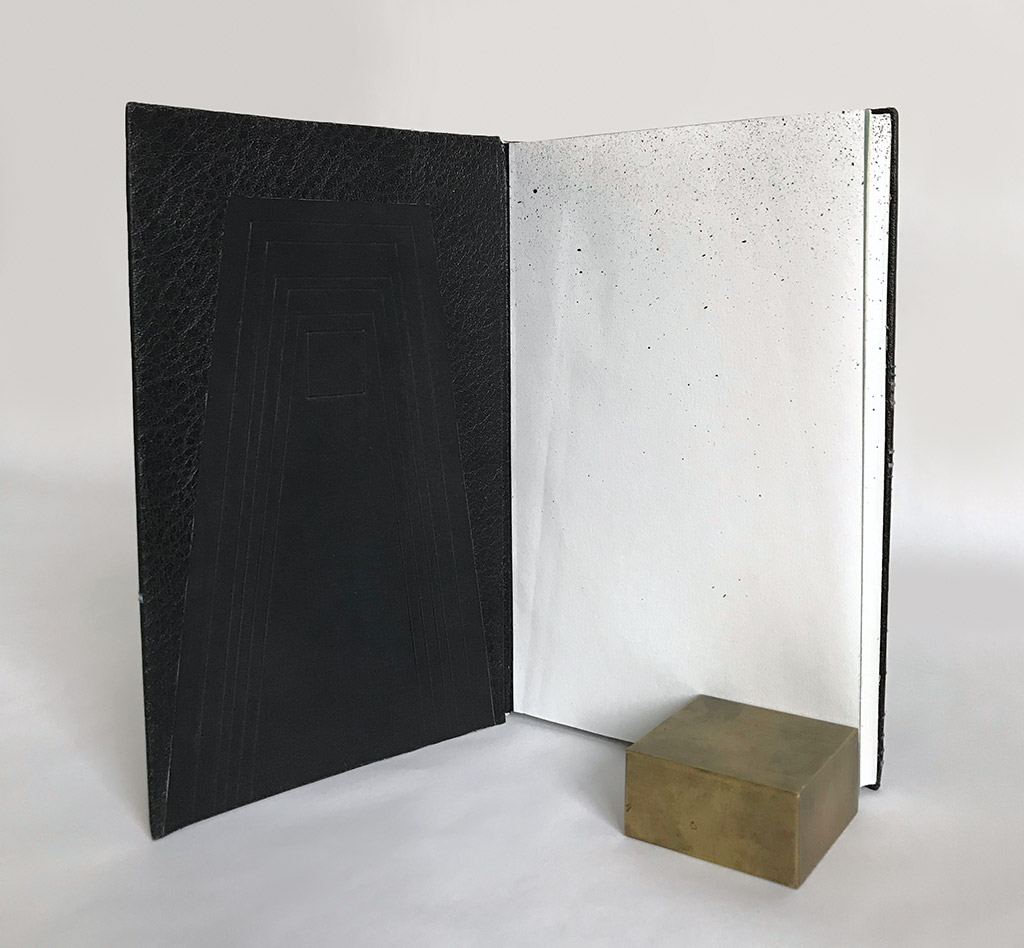 Interior of 2001: A Space Odyssey binding on a white table.