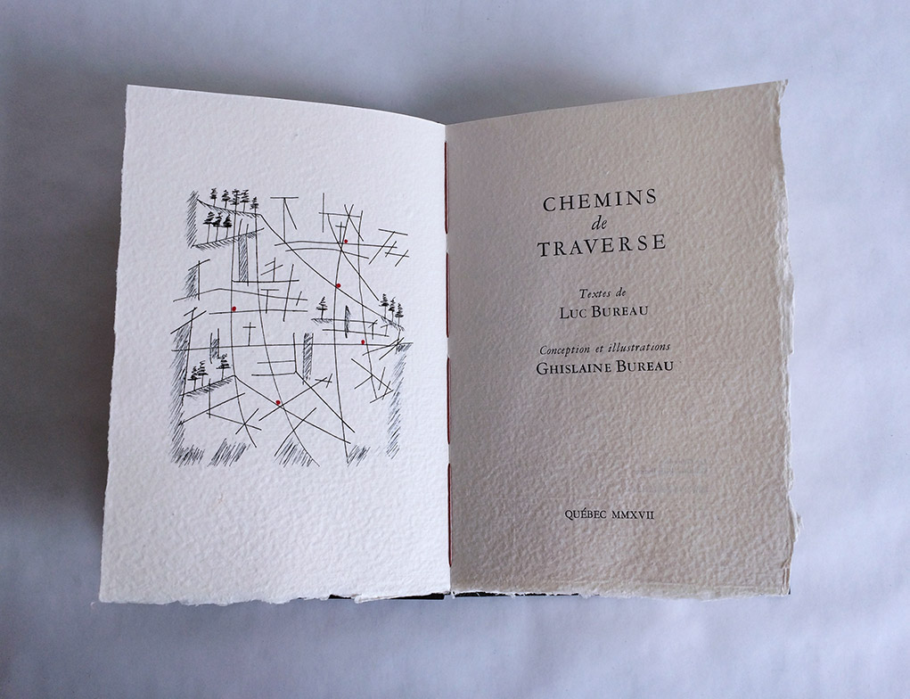 Interior of Chemins De Traverse binding on a white table.
