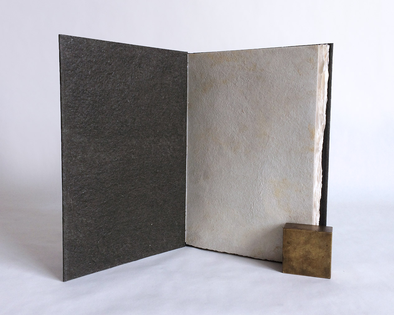 Interior of Chemins De Traverse binding on a white table.