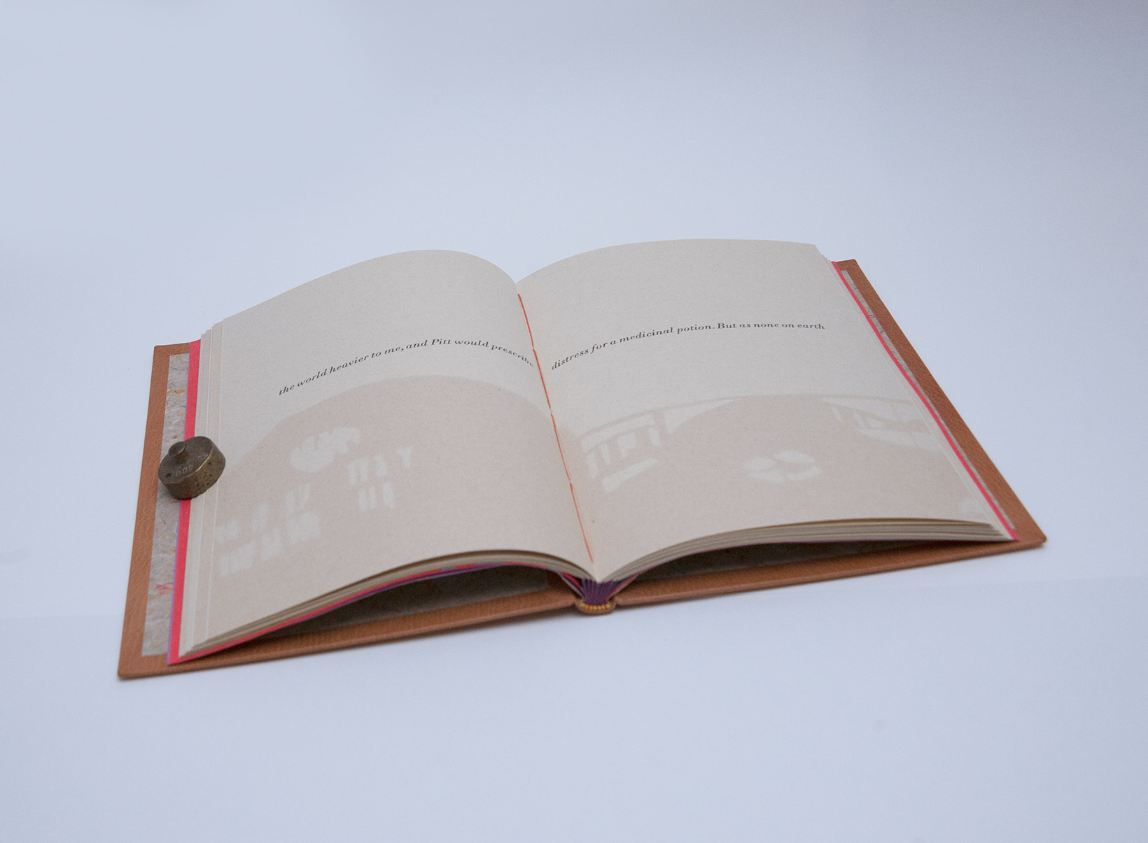 Interior of Happy Abstract binding on a white table.