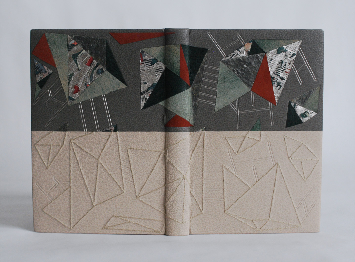 Front cover of Invisible Cities binding on a white table.