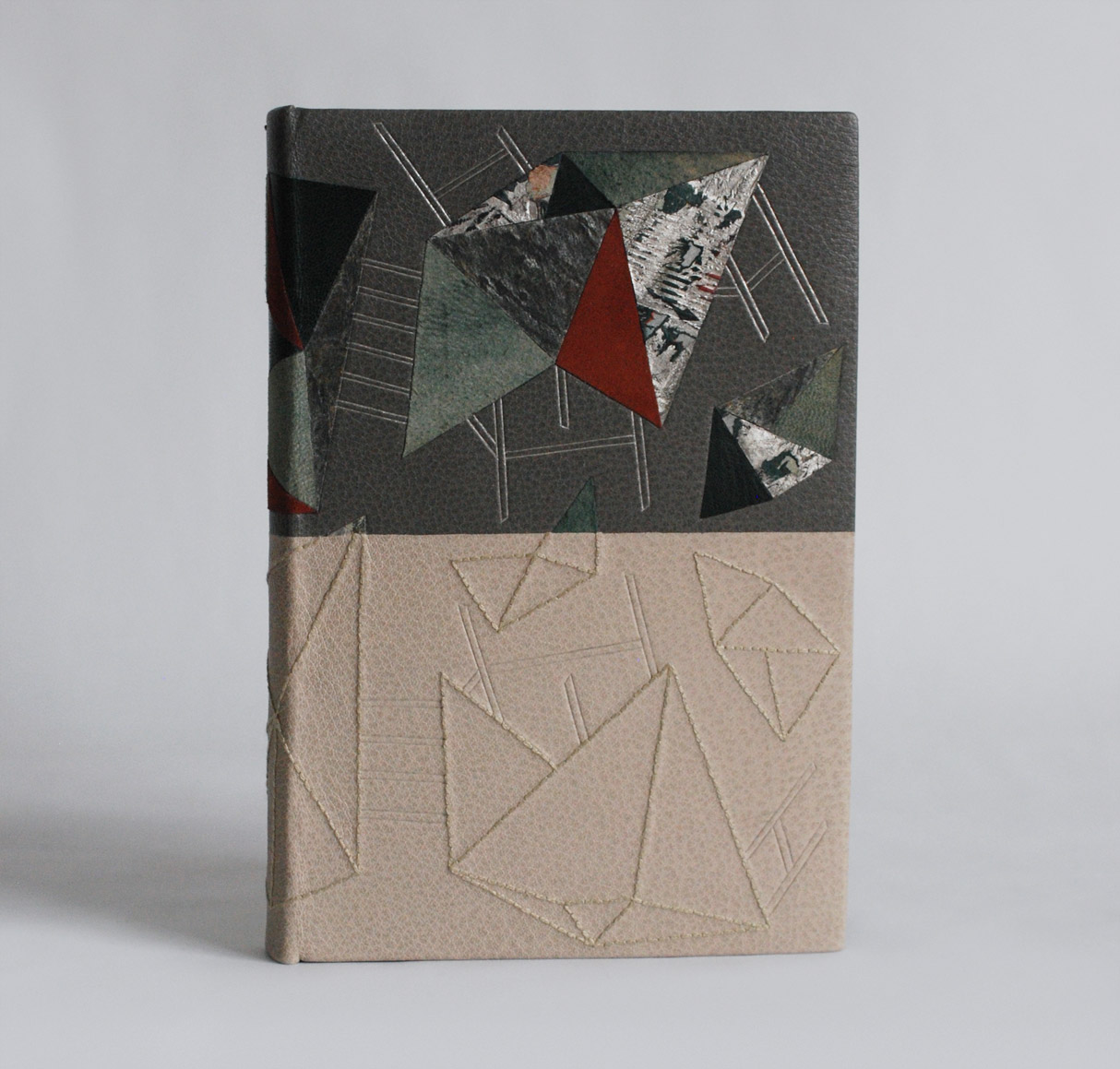 Front cover of Invisible Cities binding on a white table.