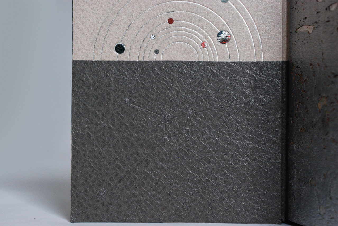 Interior of Invisible Cities binding on a white table.