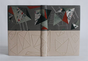 Front cover of Invisible Cities binding on a white table.