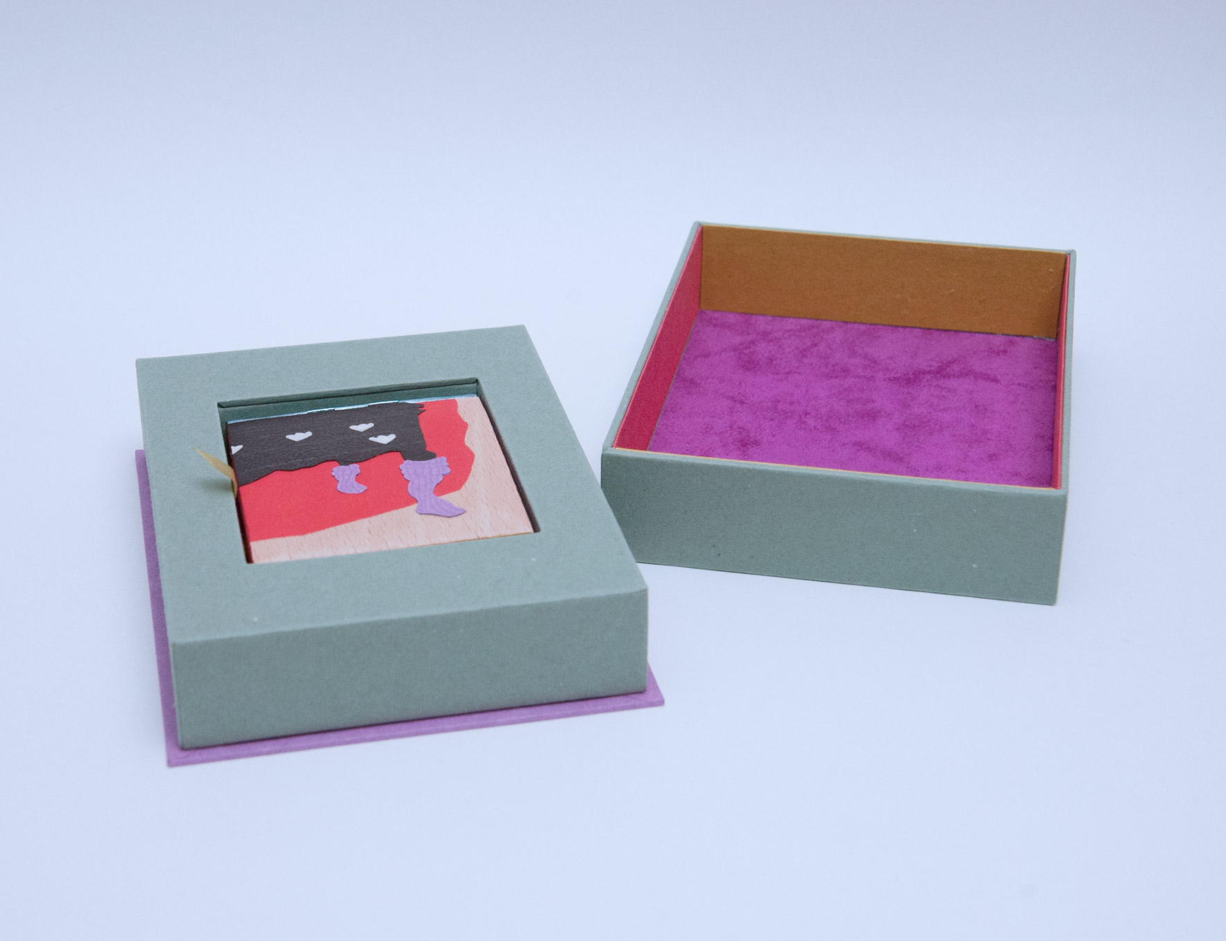 Top and bottom pieces of a Telescoping Box sitting on a white table.