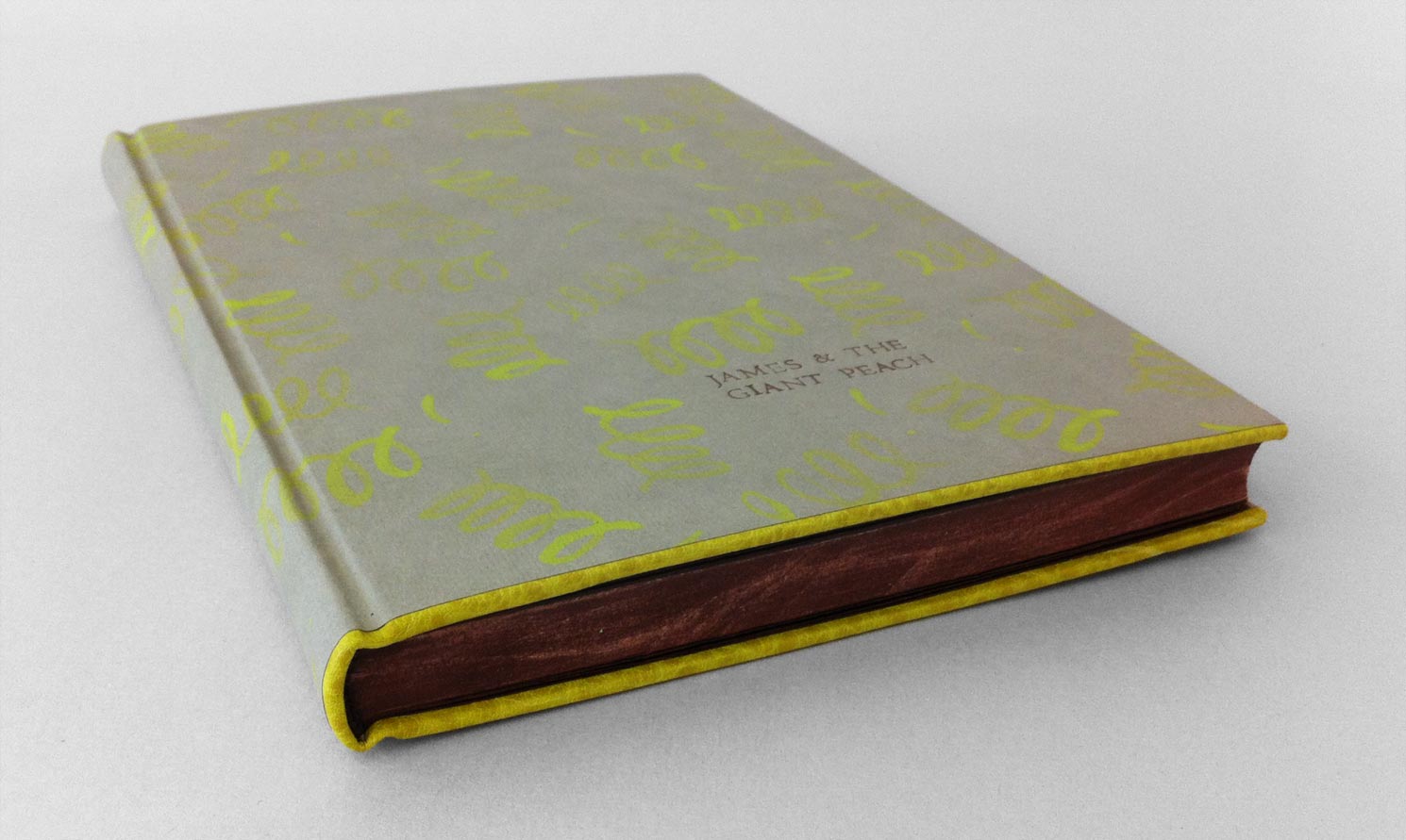 Edge of James and the Giant Peach binding on a white table.