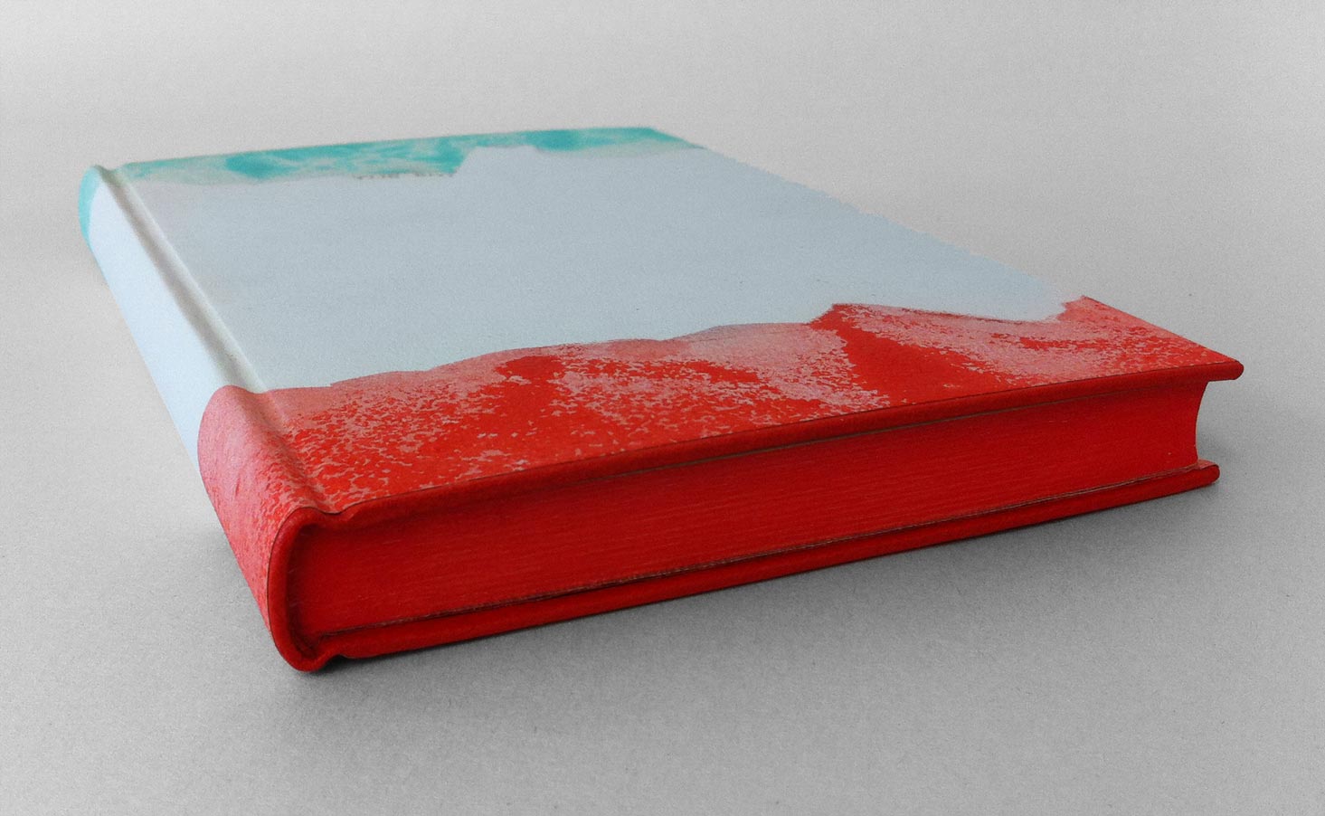 Edge of The BFG binding on a white table.