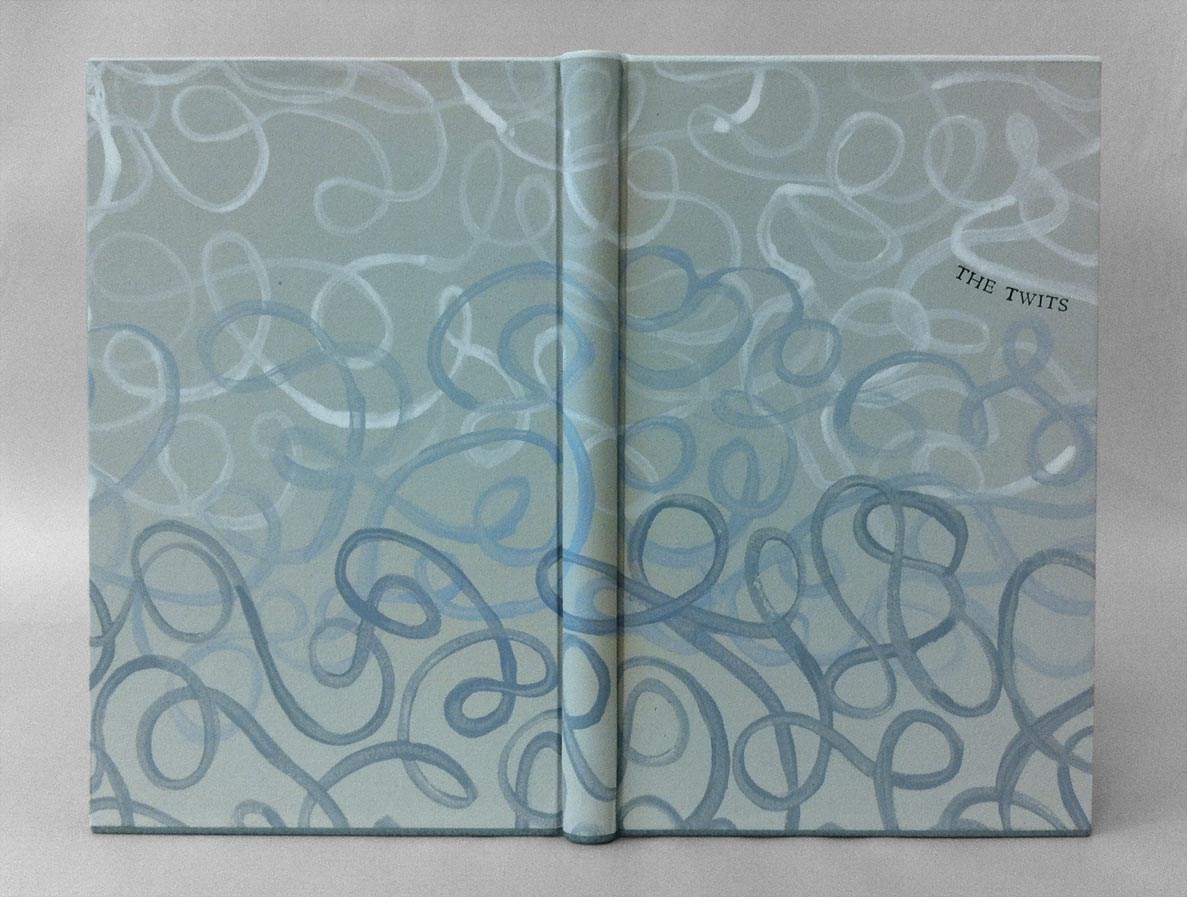 Front cover of The Twits binding on a white table.
