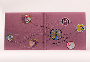 Front cover of The Seven Deadly Sins binding on a white table.