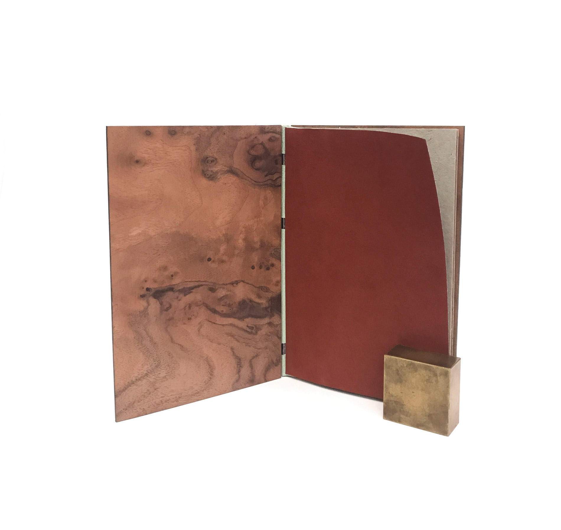 Interior of The Cabin binding on a white table.