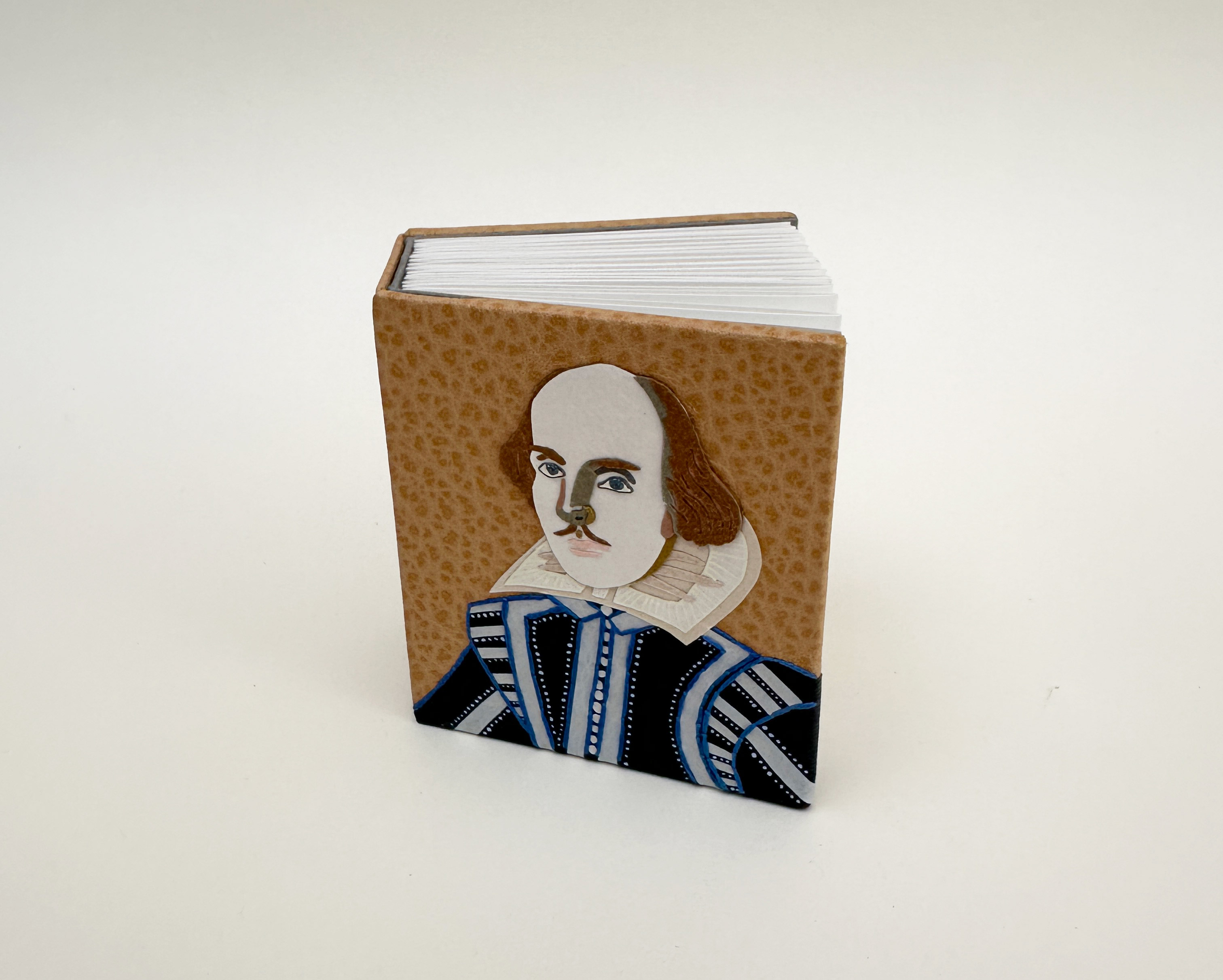 Close-up of front cover of Roadkills binding on a white table.