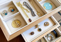 Close-up of custom jewelry trays with jewelry.