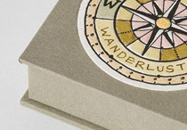 Front cover of box for Wanderlust binding.