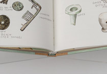 Open view of the artist book The Treasure Museum.