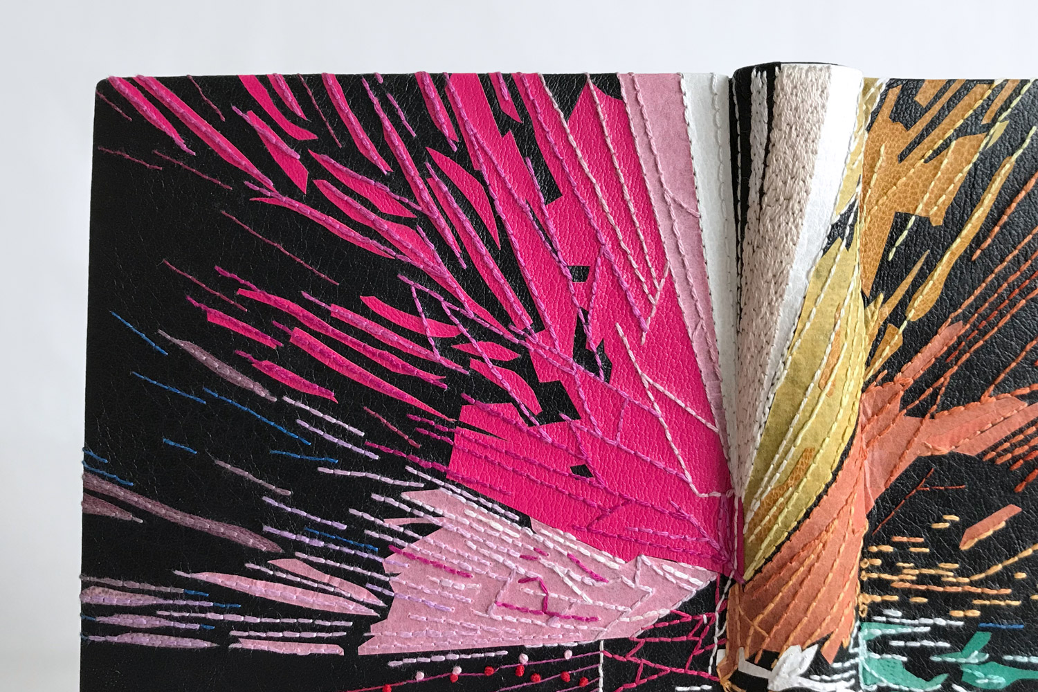 Up-close on the front cover embroidery and onlays of 2001 A Space Odyssey fine binding.