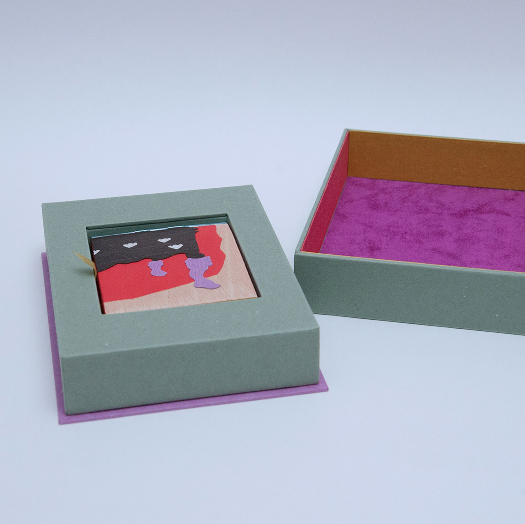 Close-up on the interior of a Telescoping Box on a white table.